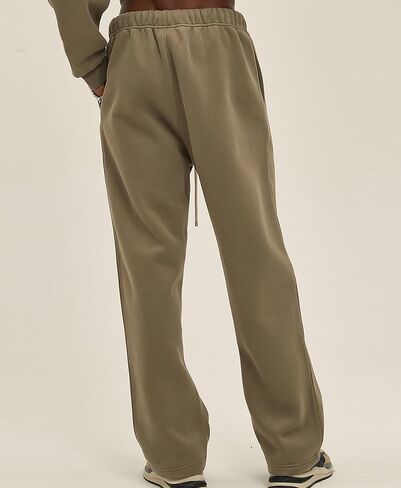 بنطال شتوي فضفاض للرجال من القطن بنطال رياضي كاجوال فضفاض برباط مع جيوب in Kuwait