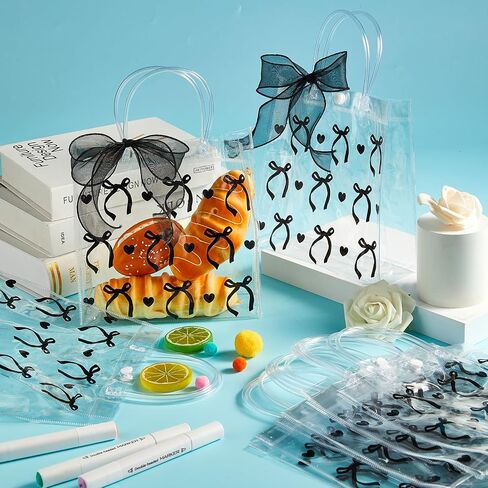 Qoubai 24pcs القوس الوردي واضحة أكياس الهدايا PVC مع مقابض الشريط Bowknot Bulk Coquette Bow Goodie Treat in Kuwait