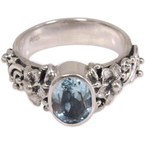 NOVICA Artisan Handmade Blue Topaz Single Stone Ring Oval Cut Silver with Floral Design Sterling Cocktail Indonesia Serenity Birthstone 'Frangipani Path'
