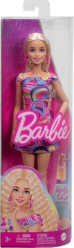 Barbie Fashionistas Doll #237 with Wavy Blonde Ponytail Wearing Blue Bow Halter Dress, Black Hair Bow Accessory and Matching Blue Heels in Saudi Arabia