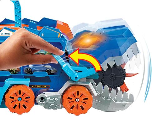 Hot Wheels City Toy Car Track Set, Ultimate T-Rex Transporter, Dinosaur Hauler for 20+ Vehicles, Semi Transforms into Dino with Lights & Sounds in Saudi Arabia