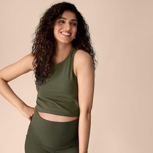 أمومة الأمومة النسائية المليئة على شورتات راكب الدراجة النارية في البطن ومجموعة الحمل أعلى الخزان من الخزانات ، أوبال ، متوسطة in Kuwait