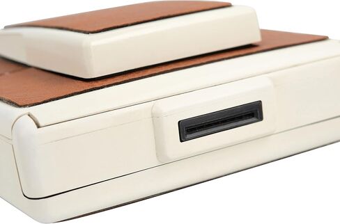 كاميرا بولارويد SX-70 Land Camera Model 2 - كاميرا فيلم فورية كلاسيكية (جسم أبيض، جلد بني) | التركيز اليدوي، تصميم قابل للطي، يعمل مع فيلم SX-70 (متجدد) in Saudi Arabia