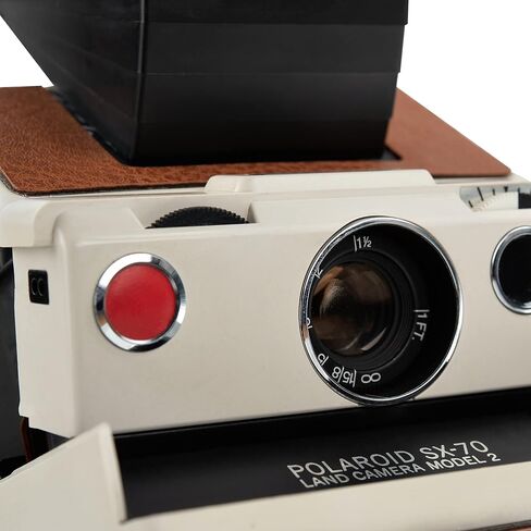 كاميرا بولارويد SX-70 Land Camera Model 2 - كاميرا فيلم فورية كلاسيكية (جسم أبيض، جلد بني) | التركيز اليدوي، تصميم قابل للطي، يعمل مع فيلم SX-70 (متجدد) in Saudi Arabia