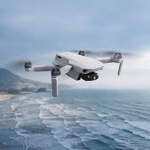 كاميرا DJI Mini 2 SE بدون طيار كوادكوبتر مع وحدة تحكم عن بعد RC-N1، فيديو QHD، ناقل حركة 10 كم، أقل من 249 جرام، العودة إلى المنزل، حزمة اللقطات الاحترافية التلقائية مع حقيبة ظهر Deco Gear + الملحقات in Kuwait
