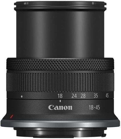 كاميرا Canon EOS R100 بدون مرآة مع عدسة مقاس 18-45 مم وذاكرة فائقة سعة 128 جيجابايت، وإضاءة فيديو LED، ومقبض U، ومجموعات مرشحات والمزيد (متجددة) in Kuwait