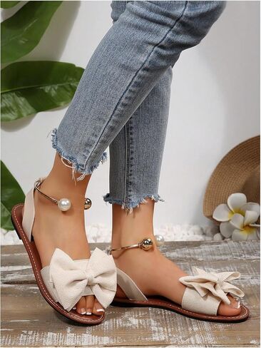 GORGLITTER Women's Bow Pearls Flat Sandals Metallic Ankle Strap Open Toe Dressy Slide Shoes in Saudi Arabia