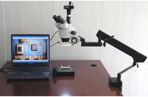 AmScope SM-6TY-FRL Professional Trinocular Stereo Zoom Microscope, WH10x Eyepieces, 7X-90X Magnification, 0.7X-4.5X Zoom Objective, 8W Fluorescent Ring Light, Clamping Articulating Arm Stand, 110V-120V, Includes 2.0X Barlow Lens in Saudi Arabia