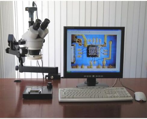 AmScope SM-6TY-FRL Professional Trinocular Stereo Zoom Microscope, WH10x Eyepieces, 7X-90X Magnification, 0.7X-4.5X Zoom Objective, 8W Fluorescent Ring Light, Clamping Articulating Arm Stand, 110V-120V, Includes 2.0X Barlow Lens in Saudi Arabia