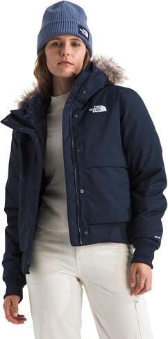 THE NORTH FACE المرأة القطب الشمالي بومبر | غطاء معزول مقاوم للماء، غطاء رأس قابل للتعديل مع فرو صناعي، جيوب مزدوجة الدخول in Kuwait