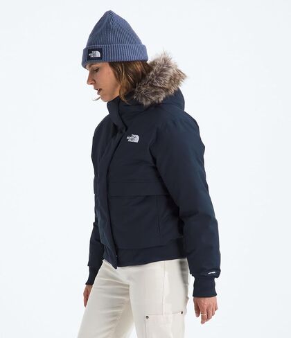 THE NORTH FACE المرأة القطب الشمالي بومبر | غطاء معزول مقاوم للماء، غطاء رأس قابل للتعديل مع فرو صناعي، جيوب مزدوجة الدخول in Kuwait
