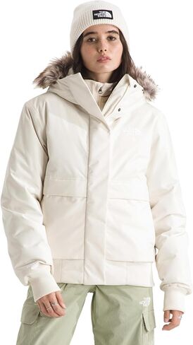 THE NORTH FACE المرأة القطب الشمالي بومبر | غطاء معزول مقاوم للماء، غطاء رأس قابل للتعديل مع فرو صناعي، جيوب مزدوجة الدخول in Kuwait