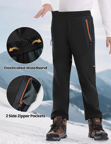 Rdruko Boys Kids Snow Ski Pants Waterproof Fleece Lined Warm Insulated Winter Pants for Outdoor Snowboard in Saudi Arabia