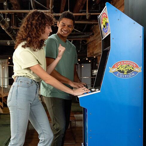 آلة Arcade1Up Street Fighter II Champion Edition Big Blue Cabinet Style Arcade مع 12 لعبة، وتشغيل بدون عملة معدنية، وشاشة مضيئة، وواي فاي، ومقعد in Kuwait