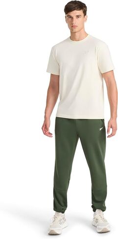 Reebok Mens Velocity Pant, Standard Fit, 31" Inseam, Lightweight Stretch Air Weave Scuba Fabric in Saudi Arabia