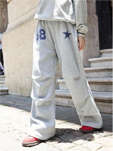 SHENHE Girl's Baggy Sweatpants Wide Leg Graphic Elastic Waist Fleece Open Bottom Sweatpants in Saudi Arabia