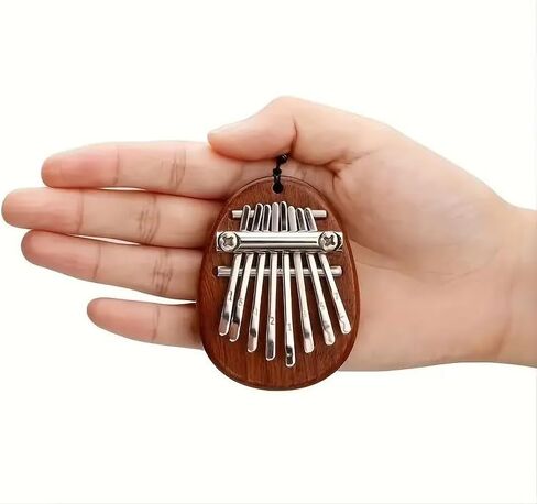 8 Keys Mini Exquisite Finger Thumb Piano Marimba Music Good Accessory Pendant Gift for Christmas, Halloween and Thanksgiving in Saudi Arabia