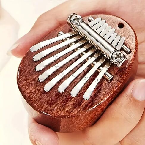8 Keys Mini Exquisite Finger Thumb Piano Marimba Music Good Accessory Pendant Gift for Christmas, Halloween and Thanksgiving in Saudi Arabia