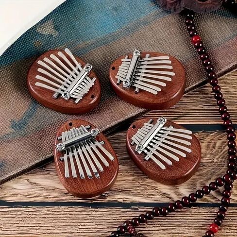 8 Keys Mini Exquisite Finger Thumb Piano Marimba Music Good Accessory Pendant Gift for Christmas, Halloween and Thanksgiving in Saudi Arabia