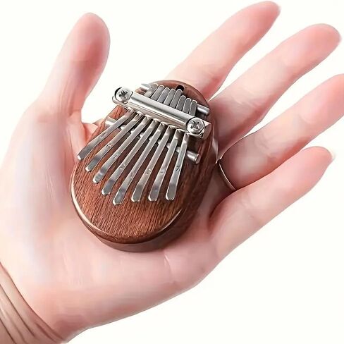 8 Keys Mini Exquisite Finger Thumb Piano Marimba Music Good Accessory Pendant Gift for Christmas, Halloween and Thanksgiving in Saudi Arabia