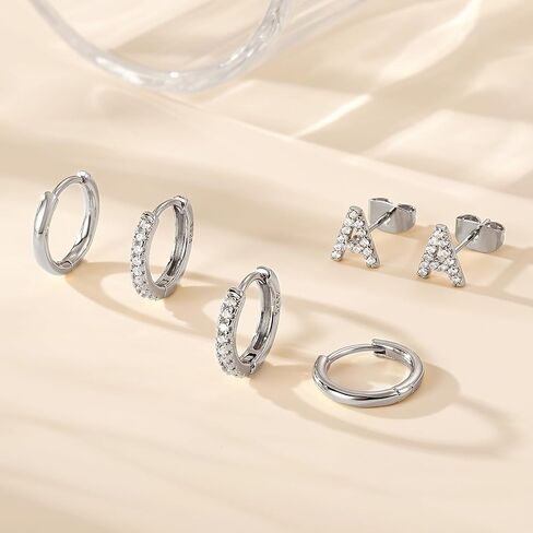 Ritach Gold Earrings for Women Girls - 3 Pairs Gold Huggie Hoop Earrings CZ Initial Stud Earrings for Women Teen Girl Gifts Hypoallergenic Cartilage Earring Set for Multiple Piercing in Kuwait