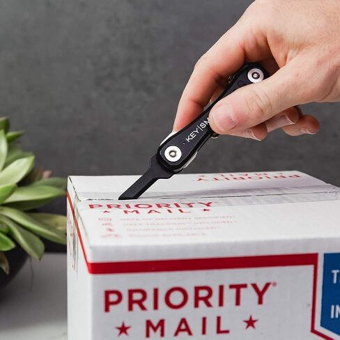 فتاحة صندوق الأمان KeySmart - فتاحة حزمة آمنة على شكل مفتاح للحمل اليومي، مع حماية للأصابع تناسب تمامًا سلسلة المفاتيح أو داخل KeySmart (أسود) in Kuwait