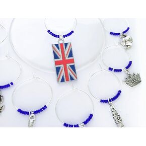 Great Britain Gift, London Wine Charms. London gift. Includes: Union Jack, Big Ben, Royal Crown, British Rose, Teapot, Double Decker Bus, Royal Guard. Set of 8. BLUE BEADS.