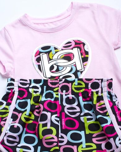 bebe Girls' Active Shorts Set - 2 Piece Short Sleeve T-Shirt and Dolphin Shorts - Cute Summer Clothing Set for Girls (4-12) in Saudi Arabia