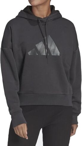 سترة أديداس الرياضية للسيدات Future Icons Feel Fierce Graphic Hoodie، كربون in Saudi Arabia