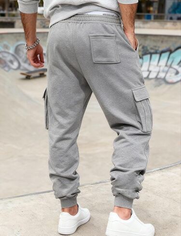 Men's Casual Cargo Pants Workout Joggers Stretch Sweatpants Lounge Athletic Pants Drawstring Pants with Pockets in Kuwait