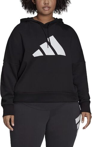 سترة بقلنسوة للسيدات من ADIDAS باللون الأسود الممتد برباط مضلع وأكمام بسحاب وشعار جرافيك وأكمام دولمان بدون ياقة ملابس نشطة بالإضافة إلى 1X in Saudi Arabia