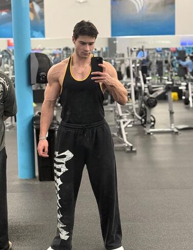 Men's Graphic Baggy Sweatpants Men Gym Pants Stretchy Casual Athletic Joggers with Pockets for Workout Training in Saudi Arabia