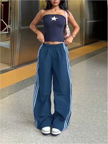 Gorglitter نساء الساق الواسعة الساق السراويل y2k منخفضة الجانب يرتفع مخطط palazzo sweatpants in Saudi Arabia