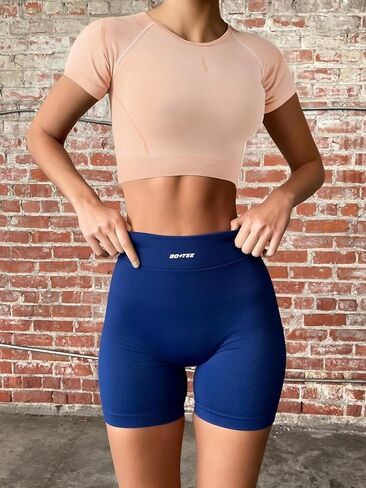 Women's Seamless Yoga Short Sleeve Shirt with Contoured Shoulder Stitching and Elastic Waist Stretch Activewear for Gym in Saudi Arabia