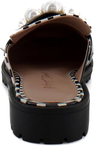 Betsey Johnson Women's Norah ، Leopard Floral ، 6.5 in Saudi Arabia