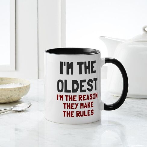 CafePress I'm The Oldest Make Rules Mug 11 oz (325 ml) Ceramic Coffee Mug in Saudi Arabia
