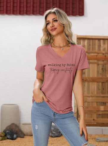 تي شيرت Walking by Faith Tripping Constantly للنساء، تي شيرت برسوم ملهمة مضحكة، قميص كاجوال برقبة على شكل حرف V in Kuwait