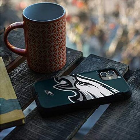 Skinit Decal Skin Compatible with OtterBox Defender iPhone 11 Case - Officially Licensed NFL Philadelphia Eagles Large Logo Design in Saudi Arabia