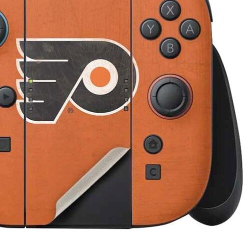 ملصق ألعاب Skinit متوافق مع وحدة تحكم Nintendo Switch 2 (2025) Joy-Con - تصميم مرخص رسميًا من NHL Philadelphia Flyers in Saudi Arabia