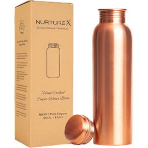 مياه نحاسية نقية، زجاجة 34 أونصة / 1 لتر، مقاومة للتسرب، خالية من المفاصل، طلاء واقي مضاد للتشوه، أدوات شرب مصنوعة يدويًا وصديقة للبيئة والأيورفيدا لليوجا وصالة الألعاب الرياضية والمكتب - سلسة in Kuwait