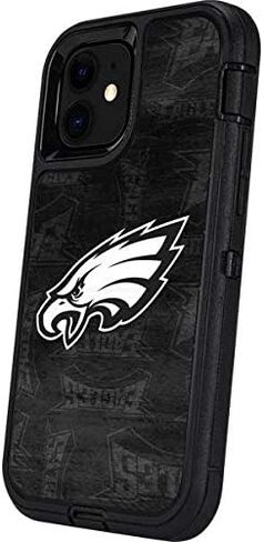 غلاف هاتف من Skinit متوافق مع حافظة OtterBox Defender Pro لهاتف iPhone 12 - تصميم مرخص رسميًا من NFL Philadelphia Eagles باللونين الأبيض والأسود in Saudi Arabia