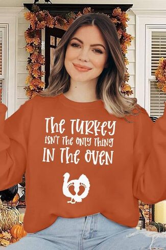 Thanksgiving Pregnant Sweatshirt Women The Turkey ain't The Only Thing in The Oven Shirt Funny Maternity Pullover Tops in Saudi Arabia