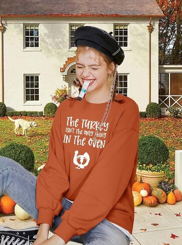 Thanksgiving Pregnant Sweatshirt Women The Turkey ain't The Only Thing in The Oven Shirt Funny Maternity Pullover Tops in Saudi Arabia