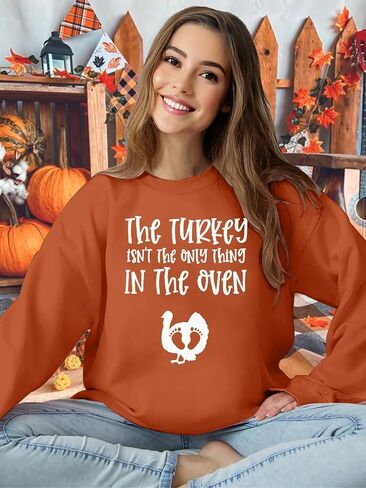 Thanksgiving Pregnant Sweatshirt Women The Turkey ain't The Only Thing in The Oven Shirt Funny Maternity Pullover Tops in Saudi Arabia