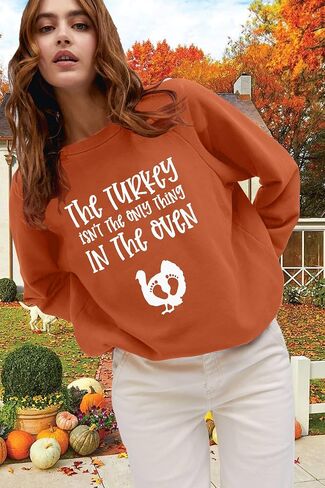 Thanksgiving Pregnant Sweatshirt Women The Turkey ain't The Only Thing in The Oven Shirt Funny Maternity Pullover Tops in Saudi Arabia