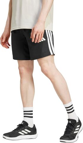 شورت Train Essentials 3-Stripes منسوج للرجال من أديداس in Saudi Arabia