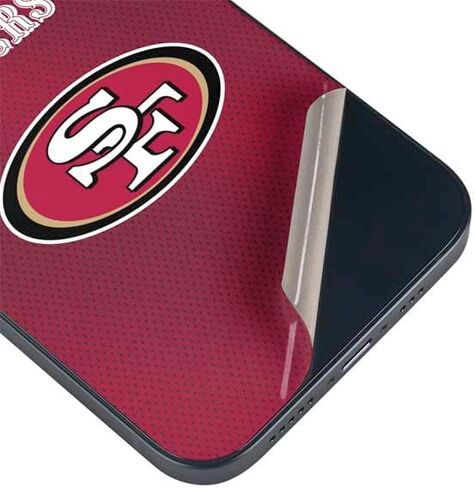 Skinit Decal Phone Skin Compatible with iPhone 15 - Officially Licensed NFL San Francisco 49ers Team Jersey Design in Saudi Arabia