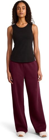 بنطال رياضي نسائي من Reebok ذو أرجل واسعة، مقاس قياسي، درزة داخلية 76.2 سم، نسيج قطن وبوليستر متوسط ​​الوزن in Kuwait