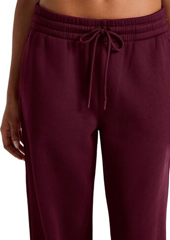 بنطال رياضي نسائي من Reebok ذو أرجل واسعة، مقاس قياسي، درزة داخلية 76.2 سم، نسيج قطن وبوليستر متوسط ​​الوزن in Kuwait