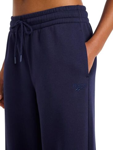 بنطال رياضي نسائي من Reebok ذو أرجل واسعة، مقاس قياسي، درزة داخلية 76.2 سم، نسيج قطن وبوليستر متوسط ​​الوزن in Kuwait